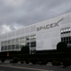 A Falcon 9 rocket is displayed outside the SpaceX headquarters on January 28, 2021 in Hawthorne, California.